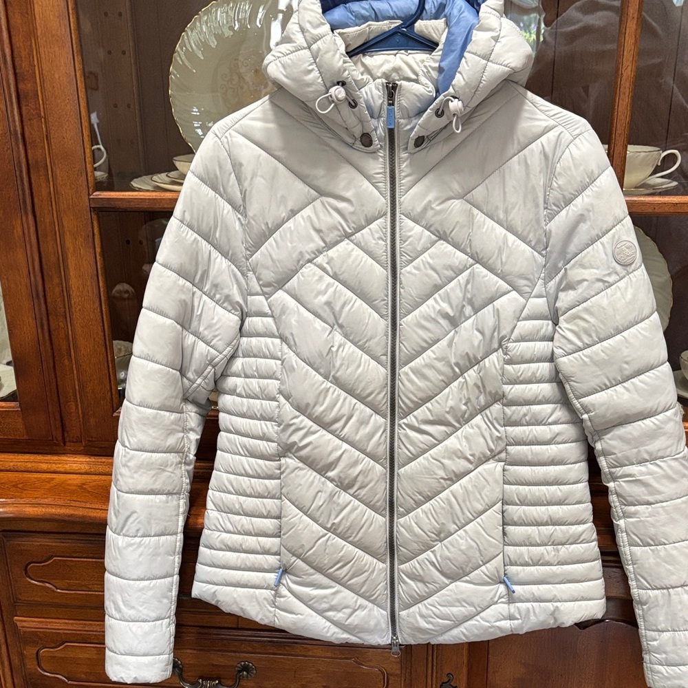Barbour Quilted Hooded Jacket - Light dove Gray with light blue interior.